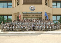 Team Lackland Airmen selected for promotion to technical sergeant pose for a group photo during the technical sergeant summit June 25. (U.S. Air Force photo/Alan Boedeker)