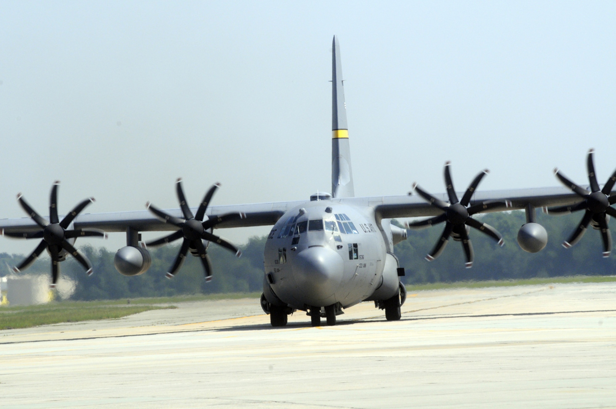 A C-130 H3 taxis from the runway at  Robins June 22 .  The aircraft has 4-8 bladed propellers whereas the normal C-130 has 4-4 bladed propellers giving  it  increased capabilities.  Modification is managed by the C-130 Aircraft sustainment group along with oversight with the SOF/SPO organization.    U. S. Air Force photo by Sue Sapp