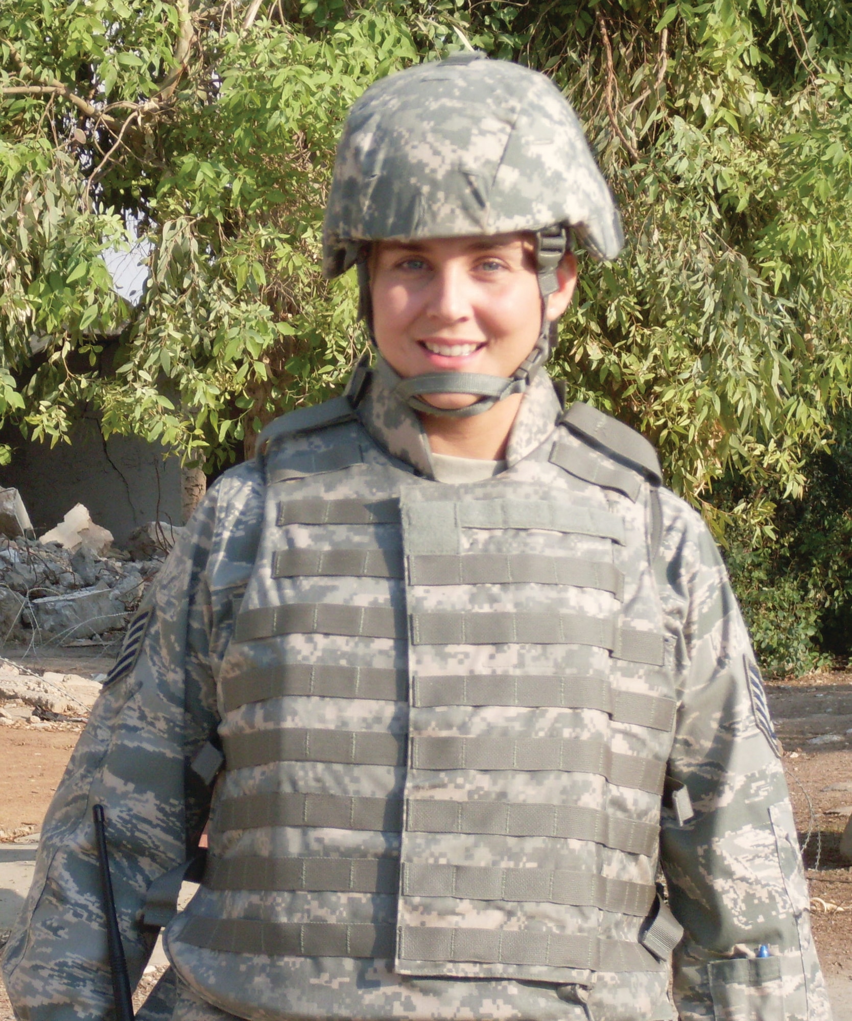 Tech. Sgt. Jennifer Laufer shown in complete “battle dress” in her deployed location in Iraq. She served alongside combat medics in providing care and comfort to battlefield casulties.