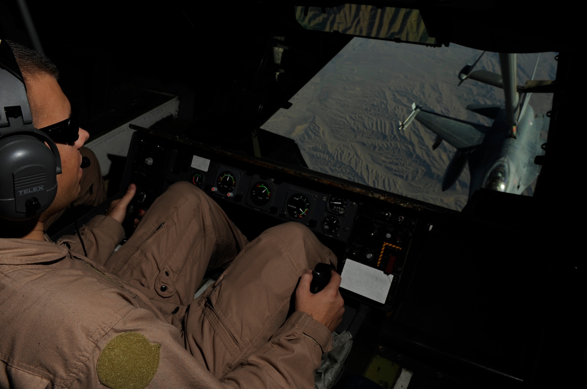 U.S. Air Force Staff Sgt. Justin Brundage, a KC-10 Extender aircraft boom operator from the 908th Expeditionary Air Refueling Squadron, refuels a Royal Netherlands air force F-16 aircraft over Afghanistan on June 18, 2009. (U.S. Air Force photo by Staff Sgt. Jason Robertson)