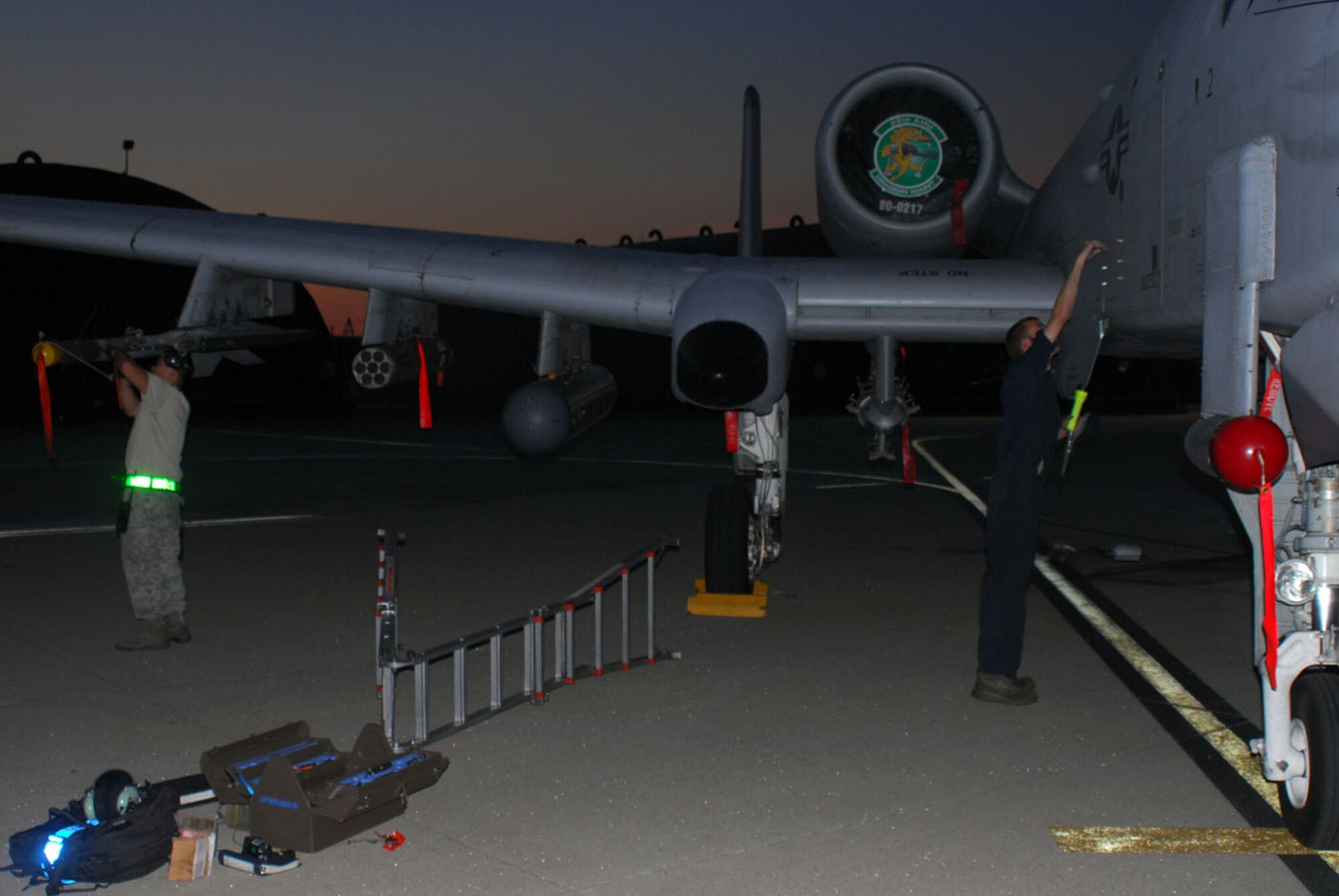 Crew chiefs from the 25th Aircraft Maintenance Unit  perform a post-flight inspection on an A-10 after its flight here June 23. (U.S. Air Force photo/Staff Sgt. Terri Barriere)