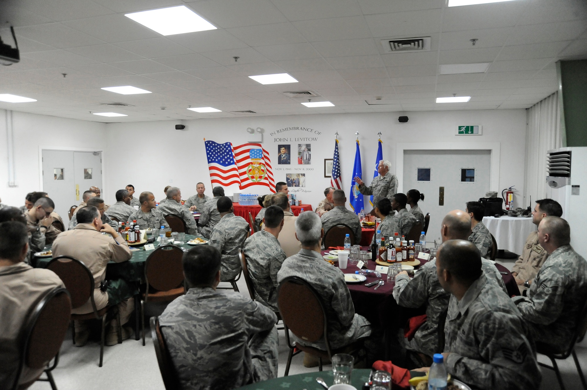SOUTHWEST ASIA -- Gen. Art Lichte, Air Mobility Command Commander, speaks to Airmen during his visit to the 380th. General Lichte took some time during a tour of the Central Command area of responsibility to visit with Airmen and talk about what AMC assets contribute to current overseas contingency operations. (U.S. Air Force Photo by Staff Sgt. Mike Andriacco) (Released)