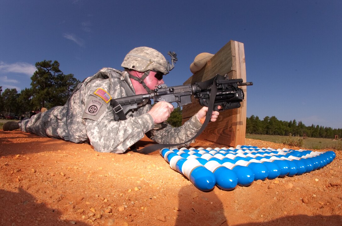 U.S. Army Sgt. Cameron Channell fires a training round from the new M320 grenade launcher while learning to use the weapon on a Fort Bragg, N.C., range, July 1, 2009. Channell is a mechanic assigned to the 82nd Airborne Division's Company B, 307th Brigade Support Battalion, 1st Brigade Combat Team.