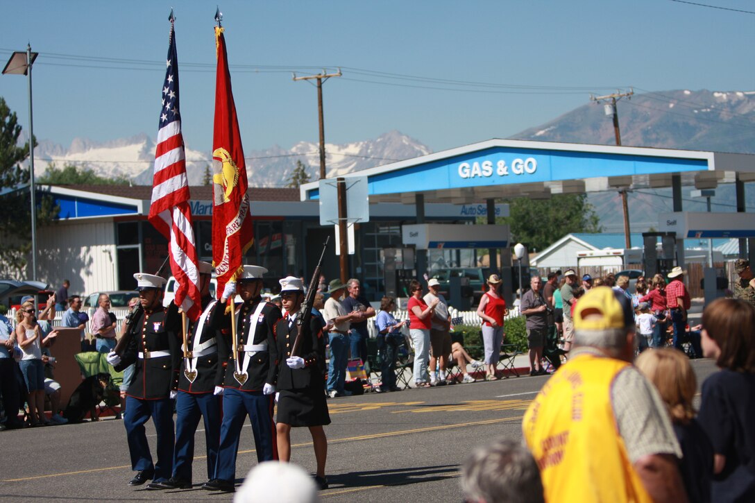 Marines from Mountain Warfare Training Center Bridgeport, Calif., carry the colors during the Independence Day parade in the nearby town of Bridgeport, July 4. The color guard's presence in the parade has been a tradition since the base was founded in the 1950s.