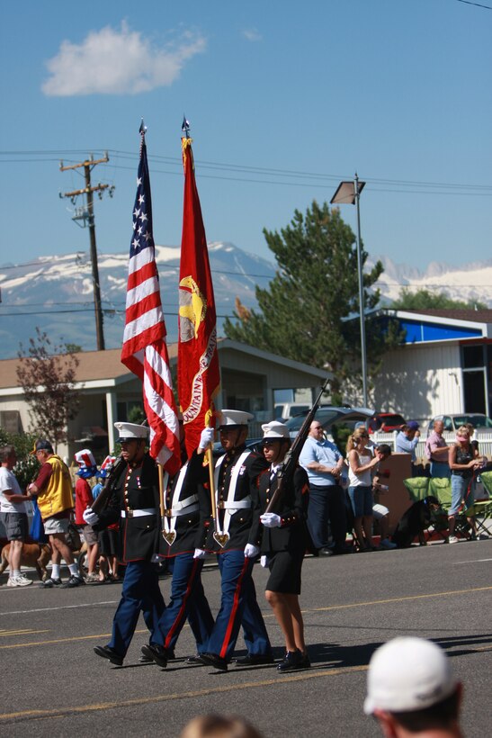 Marines from Mountain Warfare Training Center Bridgeport, Calif., carry the colors during the Independence Day parade in the nearby town of Bridgeport, July 4. The color guard's presence in the parade has been a tradition since the base was founded in the 1950s.