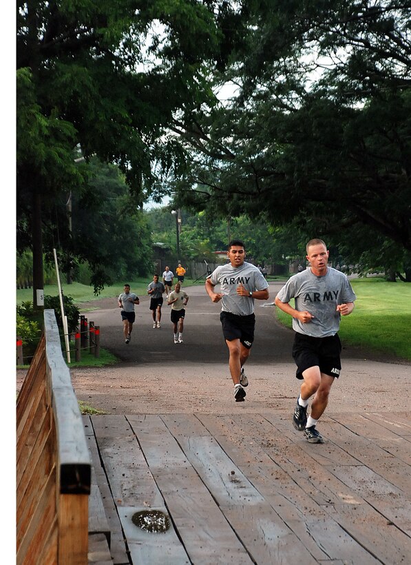 SOTO CANO AIR BASE, Honduras — Two runners who were leading the pack at about the halfway point during the Independence Day 5k fun run here July 2. More than 150 Soldiers, Sailors and Airmen participated in the run. The runners received a T-shirt, and the first and second place male and female received prizes such as coffee cups, hats and lawn chairs (U.S. Air Force photo by Staff Sgt. Chad Thompson).