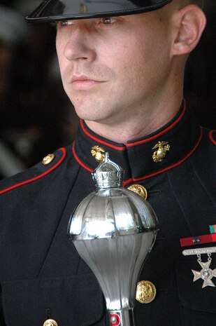 Staff Sgt. Ignatius J. Keogh, Albany Ga., Marine Corps Band , drum major, holds his mace while he waits to march on the field and play the Canadian and American National Anthem before the New York Yankees vs Toronto Blue Jays baseball game at Yankee Stadium, New York City, July 4. The band plays for more than 250,000 people each year while touring the country. (Official Marine Corps photo by Sgt. Randall A. Clinton)
