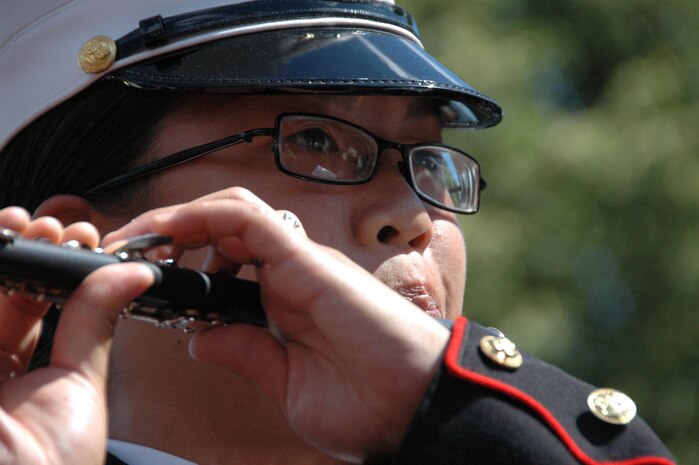 A Marine with the Albany Ga., Marine Corps Band, plays during the opening of the Statue of Liberty's crown ceremony, July 4. The band played for a naturalization ceremony for seven service members earlier in the day and then again at Yankee Stadium. (Official Marine Corps photo by Sgt. Randall A. Clinton)