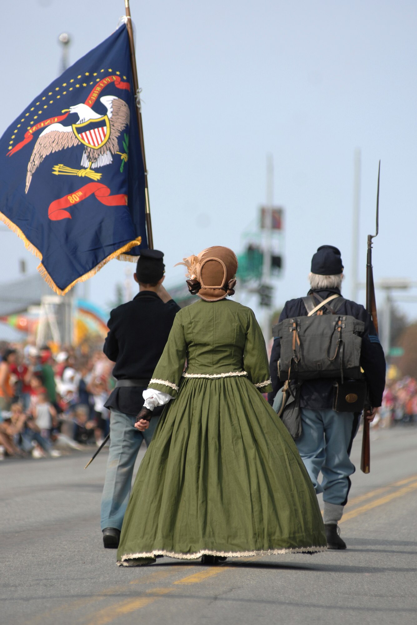 ANCHORAGE, Alaska -- Costumed participants remind the audience of the historic meaning of Independence Day during the Fourth of July Parade here. (U.S. Air Force photo/Senior Airman David Carbajal)