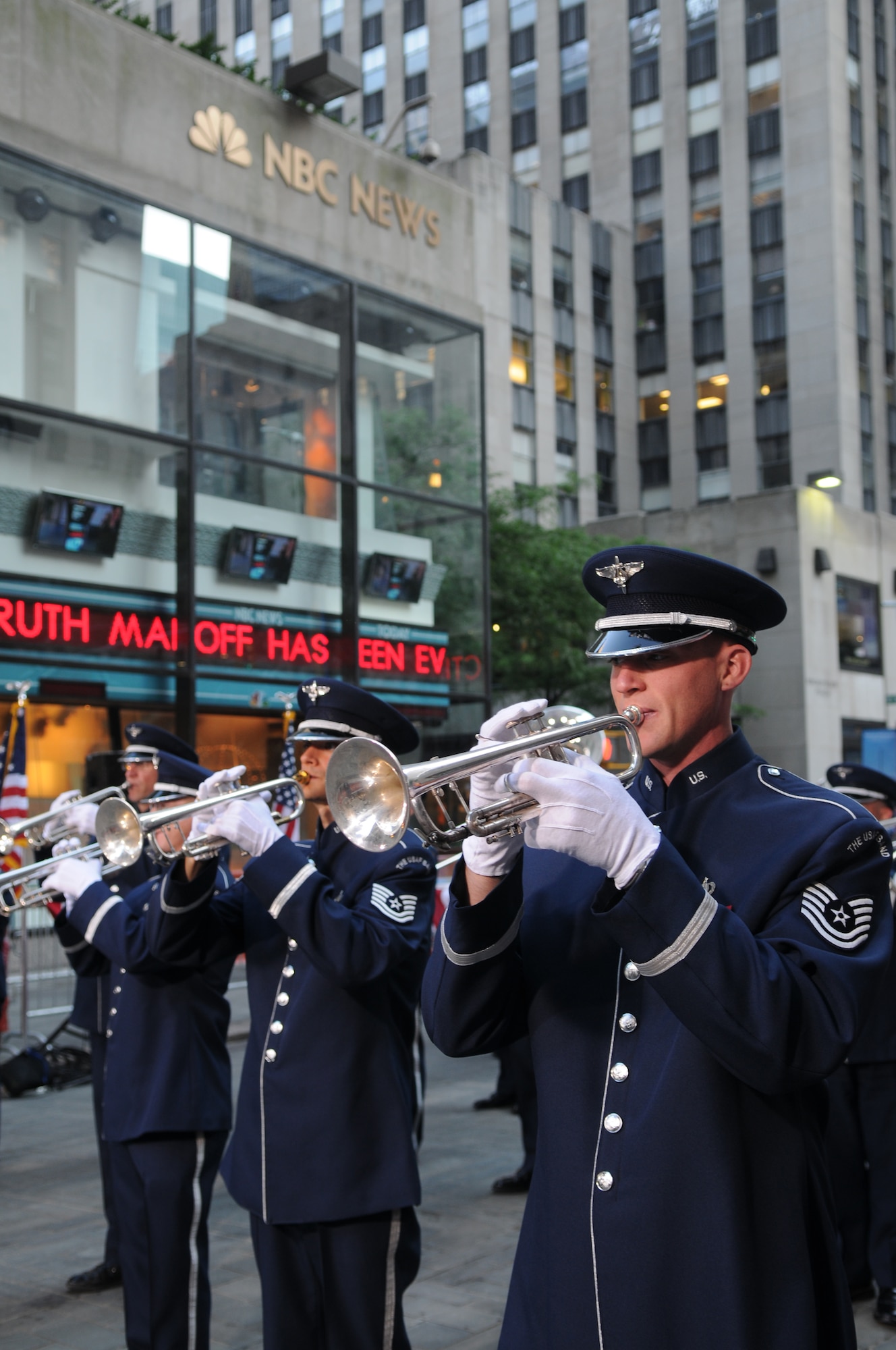Trumpet players from the United States Air Force Band Ceremonial Brass perform for millions during a live Independence Day broadcast from Rockefeller Plaza in New York City. The Ceremonial Brass performed patriotic music and marches throughout the telecast, before and after commercial breaks. (U.S. Air Force photo by Senior Airman Marleah Miller)