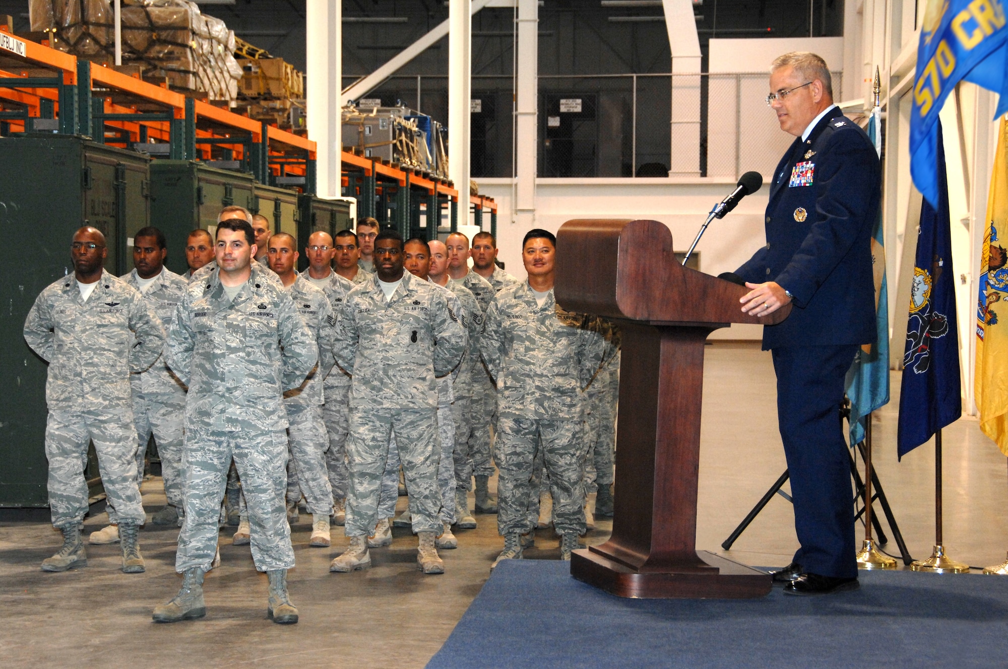 Members of the Travis Honor Guard present the colors prior to the signing of the National Anthem during the 570th Contingency Response Group change-of-command ceremony June 25. (U.S. Air Force photo/Nan Wylie)