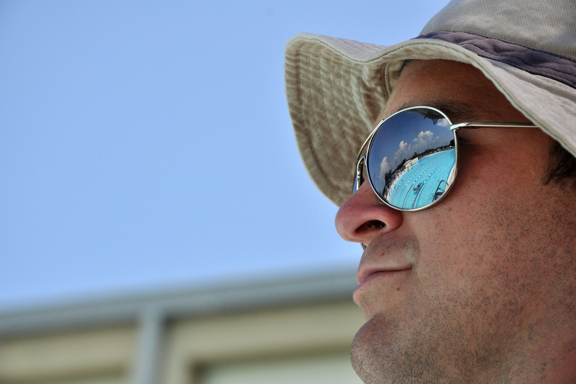 EGLIN AIR FORCE BASE, Fla. – A lifeguard keeps watch over swimmers at the East Gate pool June 16. The pool is open 6:30 am-6:30 pm, every day except Wednesday to anyone with a military ID for a fee of $2 per person. (U.S. Air Force photo/ Airman Anthony Jennings)