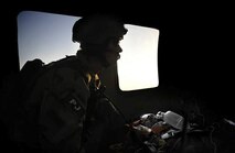 Staff Sgt. William Lawson, a pararescueman with the 129th Expeditionary Rescue Squadron, cares for a wounded Afghan National Army soldier while aboard an HH-60G Pave Hawk helicopter above the Hemland Province, Afghanistan, June 27. Sergeant Lawson, a trained paramedic, provides care to the injured soldiers until they can be safely delivered to a hospital. (U.S. Air Force photo/Staff Sgt. Shawn Weismiller)