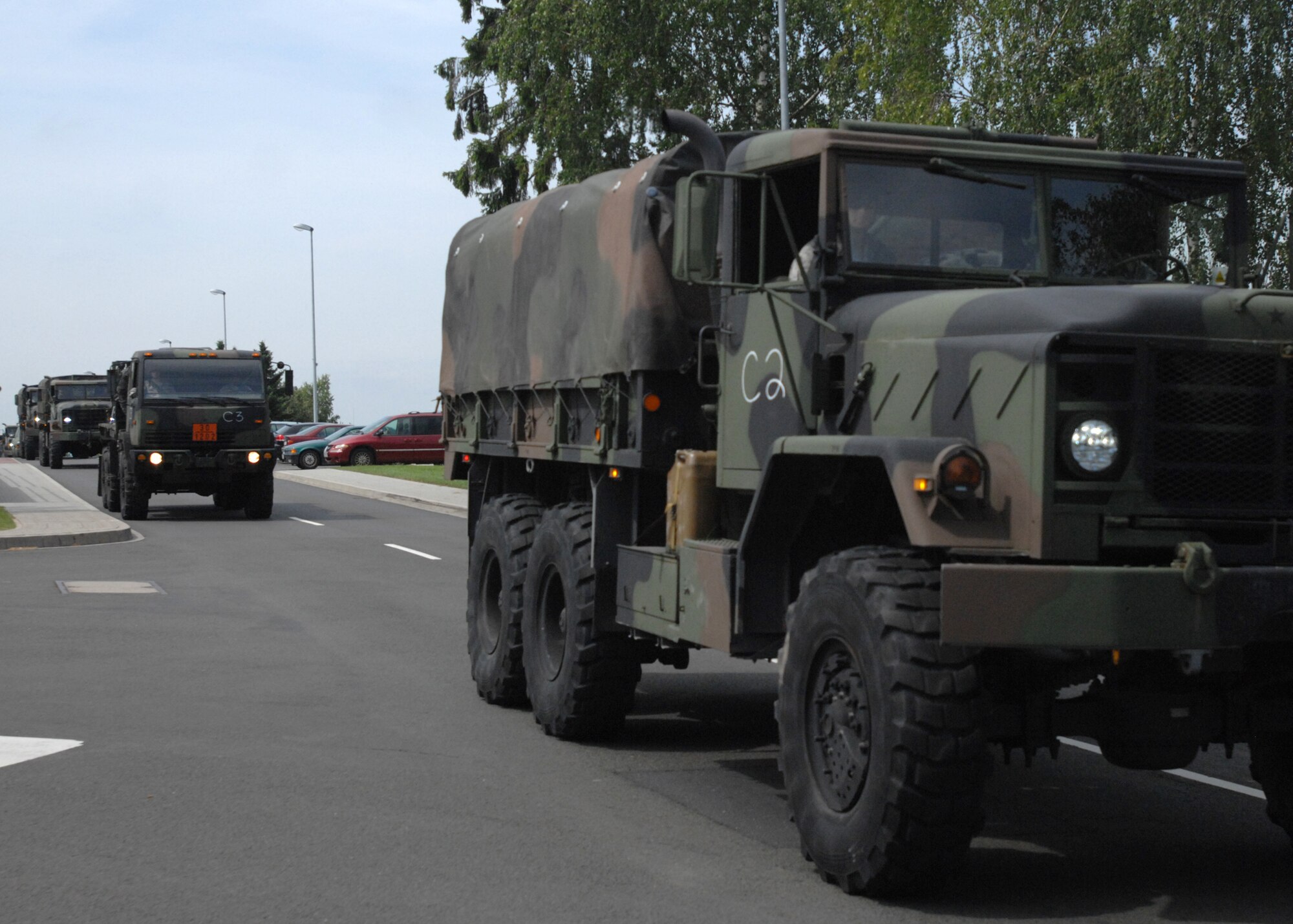 SPANGDAHLEM AIR BASE, Germany -- Airmen in the 606th Air Control Squadron geared-up and mounted nine heavy-duty trucks to convoy down a 52-mile stretch of the autobahn here June 25. The unit conducts this training semi-annually, depending on deployment tasking, to maintain their proficiency driving large tactical vehicles enabling them to respond to any U.S. European Command or NATO tasking throughout Europe. (U.S. Air Force photo by Senior Airman Jenifer Calhoun) 