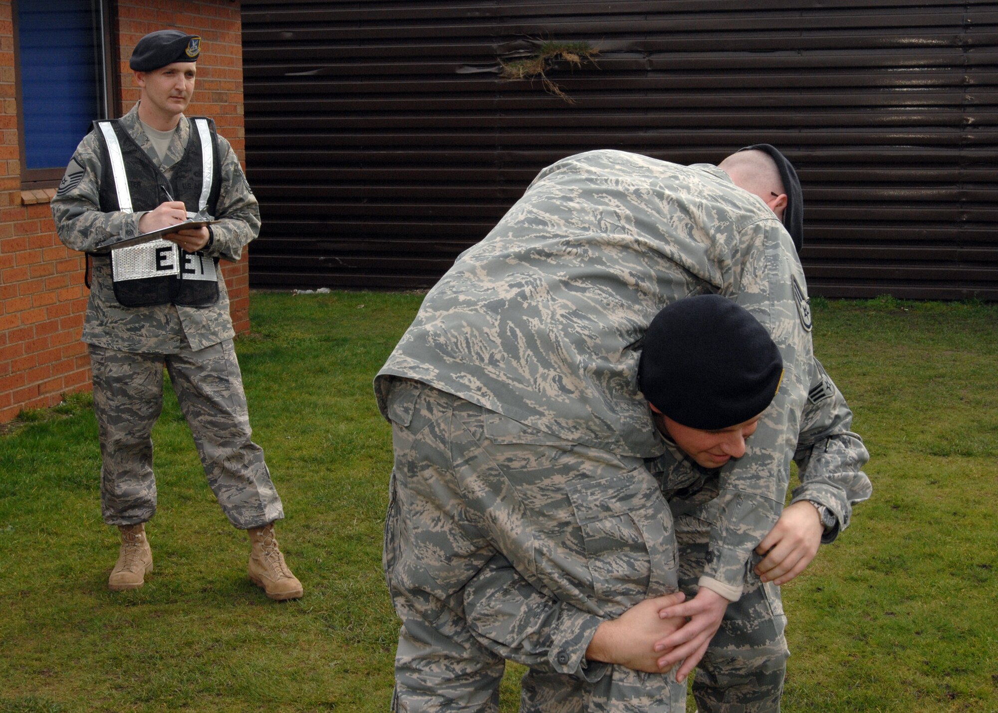 Master Sgt. John Carter, 100th Security Forces Squadron, evaluates other members of his squadron during an exercise.  Sergeant Carter was recently named one of the 12 Outstanding Airmen of the Year for 2009.  (Contributed photo)