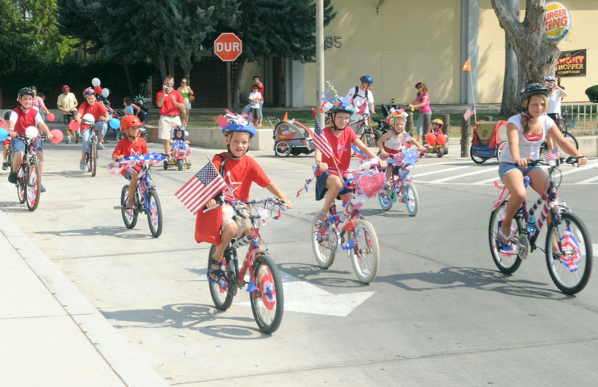Incirlik youth showcase their patriotically decorated bicycles during the Freedom Fest Fourth of July Bicycle Parade Saturday, July 4, 2009 at Incirlik Air Base, Turkey. The participants rode their bicycles from the Base Exchange parking lot to Arkadas Park. Prizes were awarded to the individuals with the best decorations for their bike category. Freedom Fest was the base’s official Fourth of July celebration and included events such as live bands, concession stands, arts and crafts, a petting zoo and a fireworks show. (U.S. Air Force photo/Senior Airman Alex Martinez)