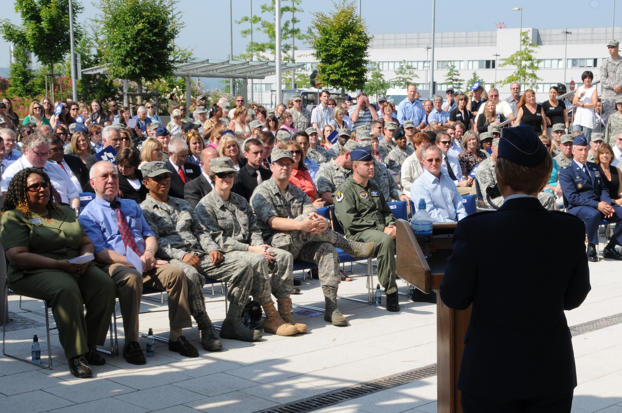 U.S. Air Force Lt. Col. Dawn Lancaster, 435th Services Squadron commander, speaks to the crowd at the Kaiserslautern Military Community Center ribbon cutting, Ramstein Air Base, Germany, July 2, 2009. Ramstein Inn’s Visitor's Quarters, Outdoor Recreation, Romano’s Macaroni Grill, a shoppette, Ramstein Tickets and Tours, the Sports Lounge and a German bakery are part of the first phase of openings at the KMCC. (U.S. Air Force Airman 1st Class Caleb Pierce) 