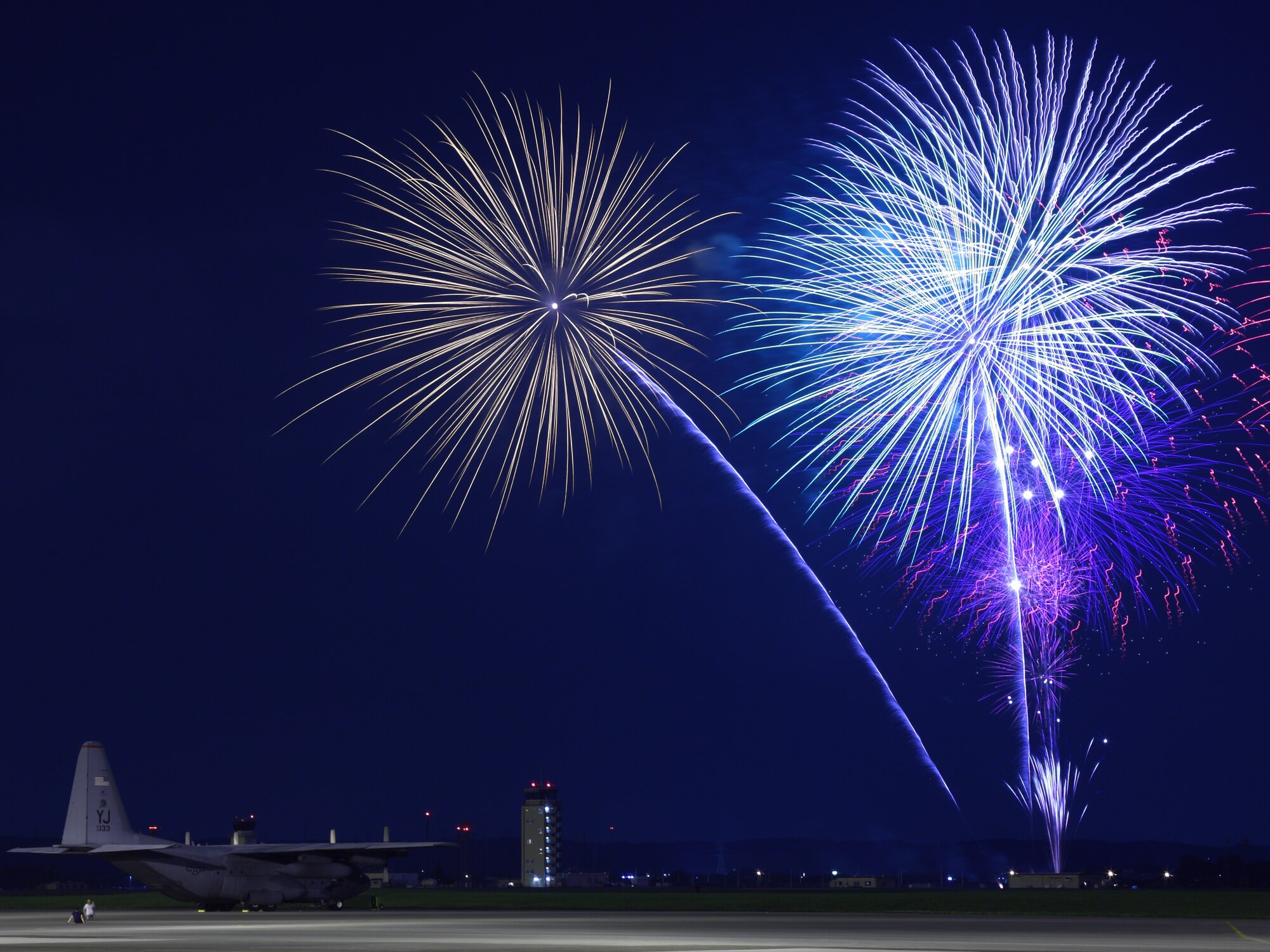 YOKOTA AIR BASE, Japan - Fireworks burst over Yokota Air Base July 4.  The 374th Force Support Squadron provided Yokota residents and their guest with events for all ages. The day kicked off with the Firecracker 5K run and a wide variety of activities throughout the day to include go-carts, petting zoo, live entertainment, food and a fireworks. (U.S. Air Force photo/Osakabe Yasuo)

