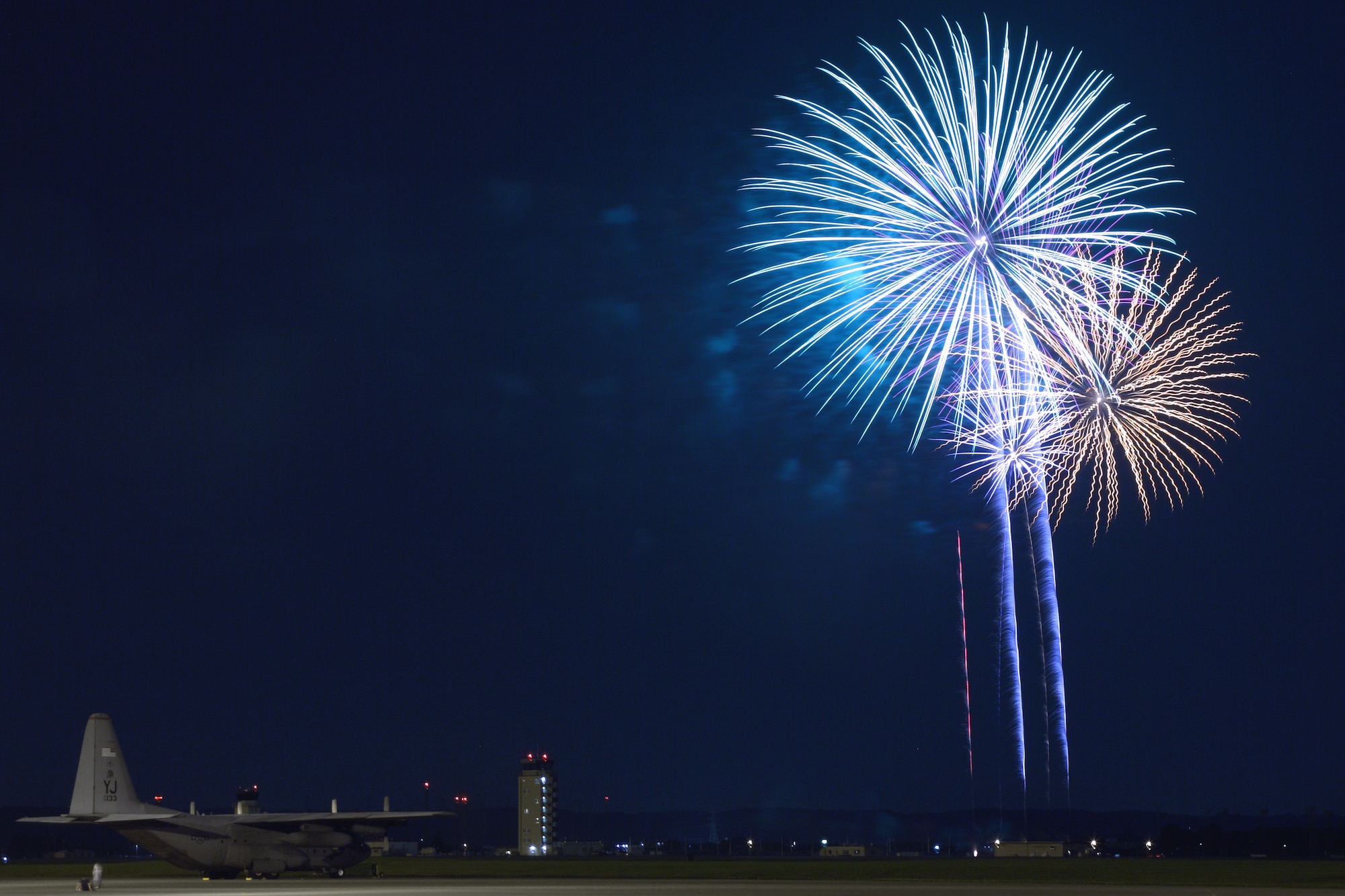 YOKOTA AIR BASE, Japan - Fireworks burst over Yokota Air Base July 4.  The 374th Force Support Squadron provided Yokota residents and their guest with events for all ages. The day kicked off with the Firecracker 5K run and a wide variety of activities throughout the day to include go-carts, petting zoo, live entertainment, food and fireworks. (U.S. Air Force photo/Osakabe Yasuo)