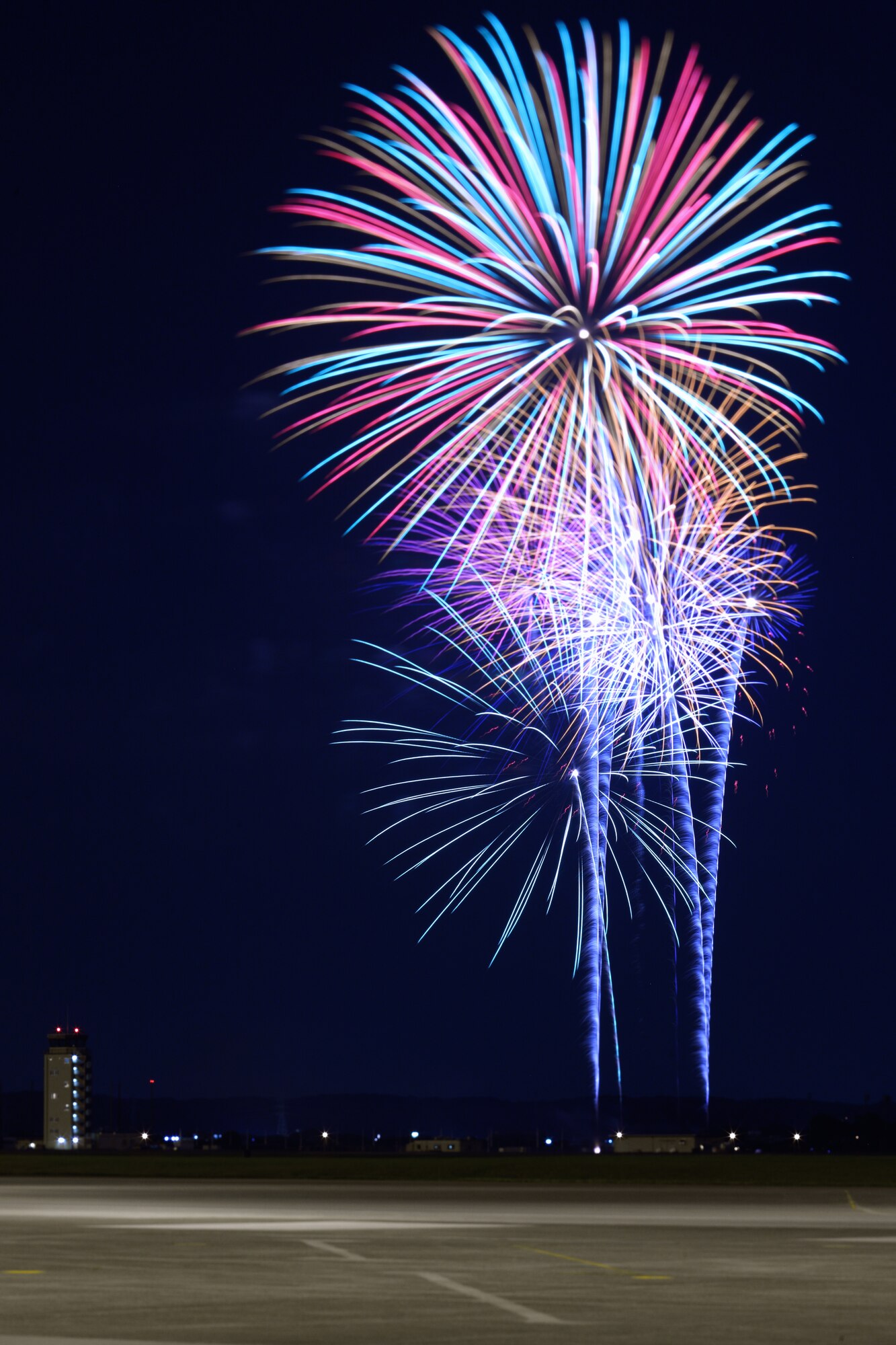 YOKOTA AIR BASE, Japan - Fireworks burst over Yokota Air Base July 4.  The 374th Force Support Squadron provided Yokota residents and their guest with events for all ages. The day kicked off with the Firecracker 5K run and a wide variety of activities throughout the day to include go-carts, petting zoo, live entertainment, food and fireworks. (U.S. Air Force photo/Osakabe Yasuo)