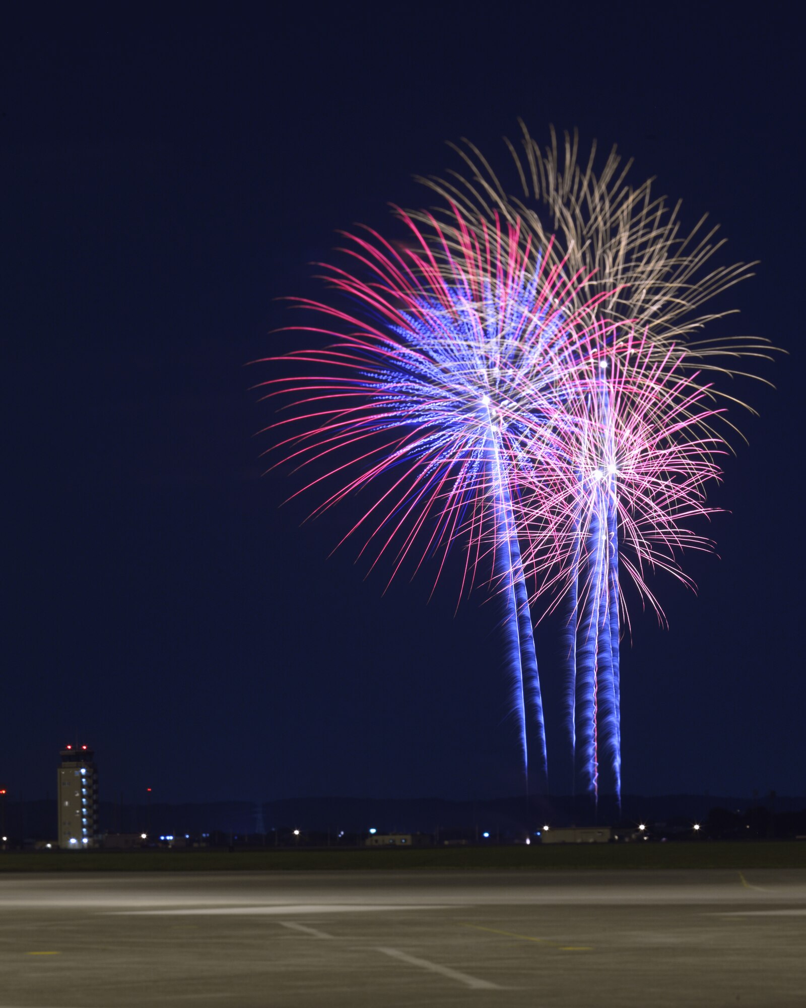 YOKOTA AIR BASE, Japan - Fireworks burst over Yokota Air Base July 4.  The 374th Force Support Squadron provided Yokota residents and their guest with events for all ages. The day kicked off with the Firecracker 5K run and a wide variety of activities throughout the day to include go-carts, petting zoo, live entertainment, food and fireworks. (U.S. Air Force photo/Osakabe Yasuo)