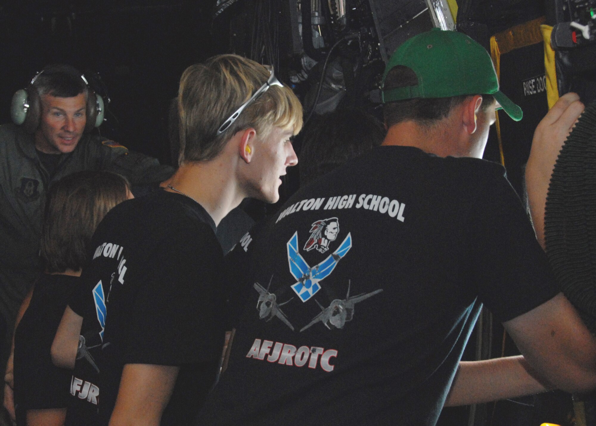 Cadets from Walton High School’s Air Force Junior ROTC unit take in the view from an in-flight MC-130E during their incentive flight June 30 as part of the 919th Special Operations Wing’s Junior ROTC Day.  Four other high school Junior ROTC programs also visited, getting tours of the life support shop, maintenance, and a similar flight opportunity.  Approximately 110 cadets toured the base.  (U.S. Air Force photo/ Staff Sgt. Samuel King Jr.)