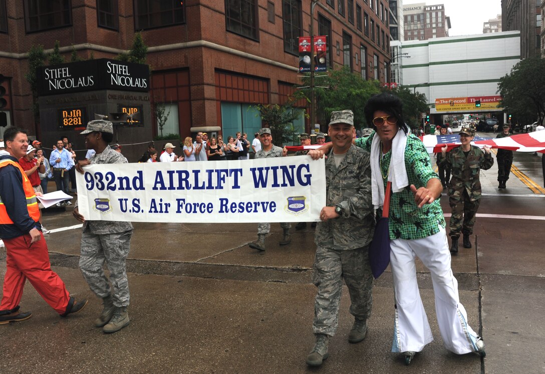 Airman from the Air Force Reserve Command's only Illinois flying wing, the 932nd Airlift Wing, came out to the July 4th parade despite heavy rain in Saint Louis.  When the rain stopped, they were greeted at the start of the parade by "Elvis" on rollerskates and a crowd of patriotic Americans thanking them from the sidelines with clapping and shouts of appreciation.  (U.S. Air Force photo/Maj. Stan Paregien)