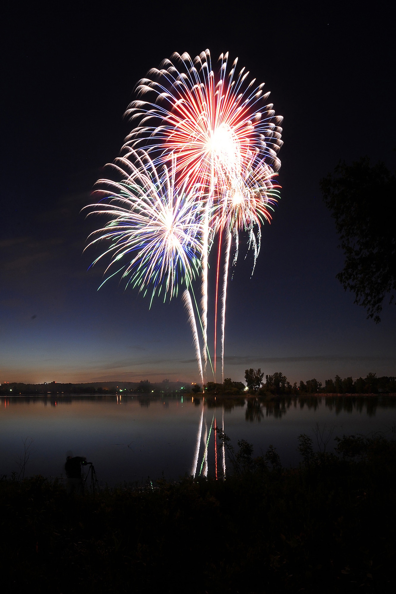 OFFUTT AIR FORCE BASE, Neb. -- A colorful blast of fireworks explode during the Independence Day celebration at the base lake July 2. The annual celebration, included games, refreshments and a fireworks display at dusk.