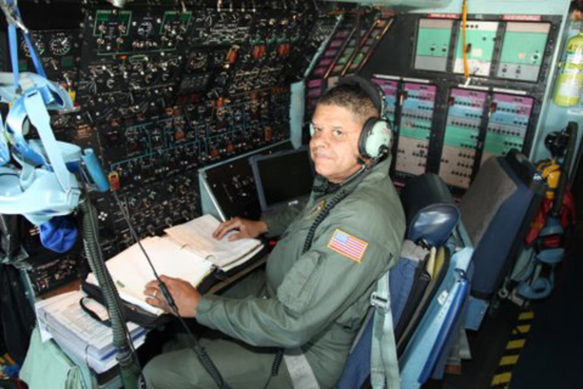 Master Sgt. Marlowe Barnes, 709th Airlift Squadron, takes his final flight during a mission to St. Croix, U.S. Virgin Islands June 27-28. Sergeant Barnes retires following 33 years of service with the 512th Airlift Wing. He worked in maintenance for 13 years and 20 years as a flight engineer. (U.S. Air Force photo)