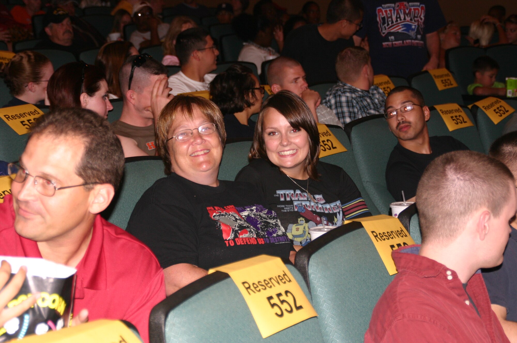 Ms. Rosemary Herman, secretary to the commander, 552 ACW, and her daughter Hannah attended the free screening of "Transformers: Revenge of the Fallen" in style, wearing their matching Transformers T-shirts.