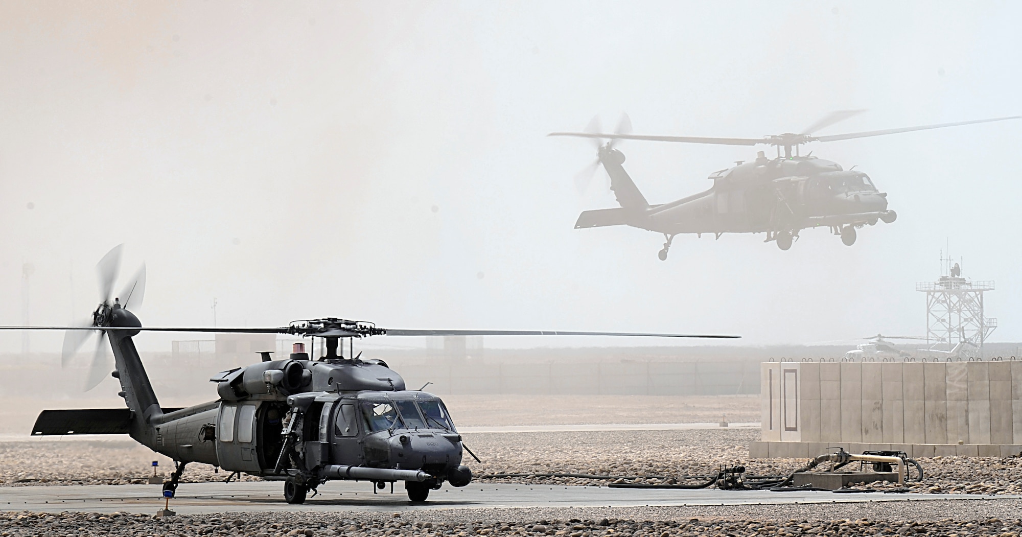 A HH-60G Pave Hawk refuels after conducting combat operations June 23 in the Hemland Province, Afghanistan. (U.S. Air Force photo/Staff Sgt. Shawn Weismiller) 
