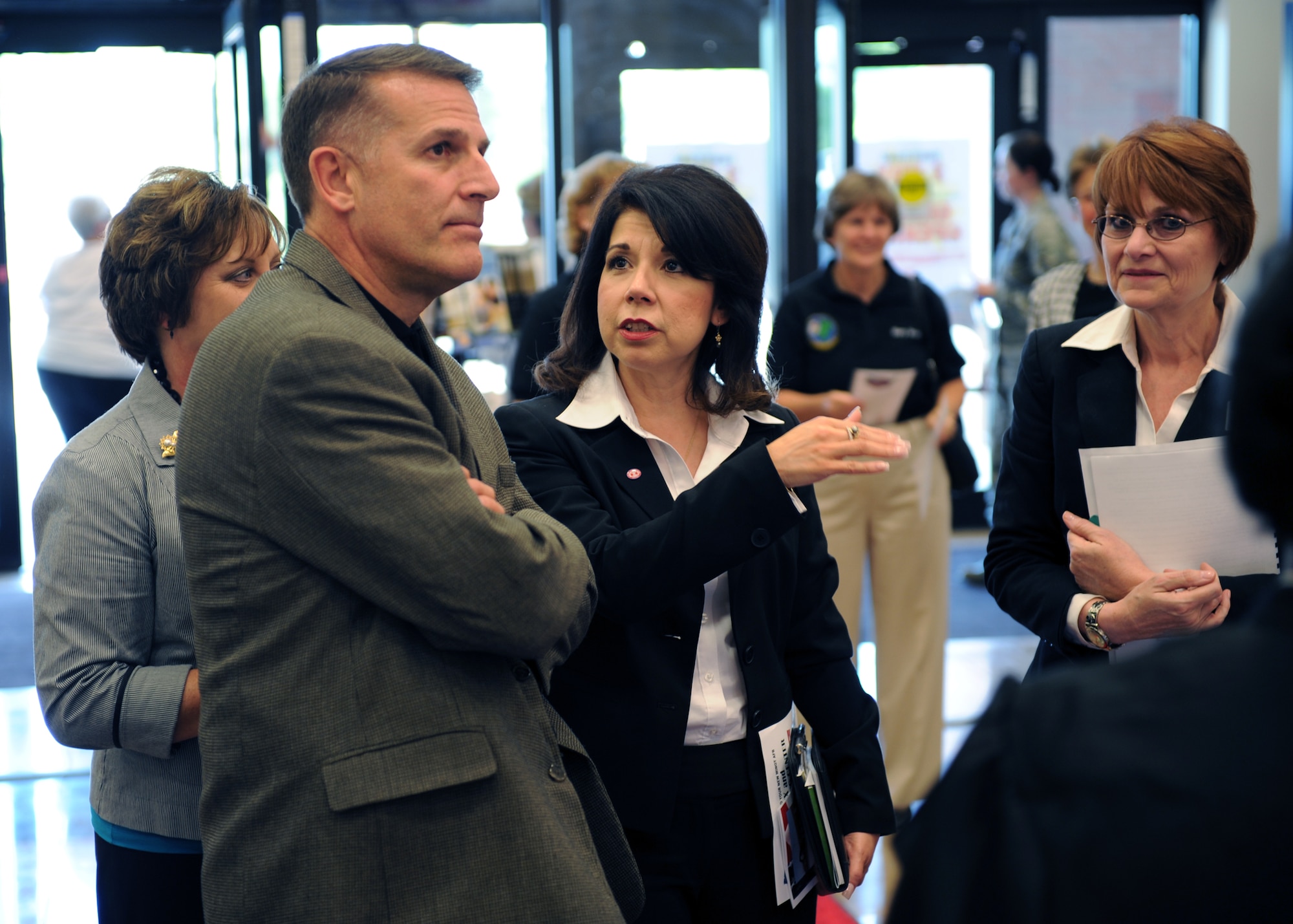 MINOT AIR FORCE BASE, N.D. -- Major Gen. Keith Thurgood, Army and Air Force Exchange Service (AAFES) commander, discusses some of the features of the new store with Trini Saucedo, North Central Region Manager for AAFES, at the distinguished visitors preview of the new AAFES facility here, July 1. This new facility is 86,000 square feet and state-of-the-art in every way, from better lighting to vastly improved store layouts.  (U.S. Air Force photo by Staff Sgt. Keith Ballard)