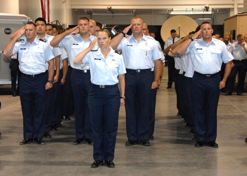 "The first salute" was presented by members of the 571st Contingency Response Group to the new  571st  Contingency Response Group commander, Colonel Tracy Skelton, during the 570th CRG  change of command ceremony on June 25th 2009. (U.S. Air Force photo by Civ/Nan Wylie) 
