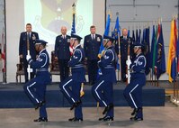 During the 571st Contingency Response Group change of command ceremony the Travis Honor Guard present "The Colors" while left to right Colonel John  Lipinski, 615th Contingency Response Wing commander, Colonel Paul Judge, the outgoing 571st Contingency Response Group commander, Colonel Tracy Skelton, the incoming 571st Contingency Response Group commander and the 571st Contingency Response Group First Sergeant, Master Sergeant Craig Brown render honors to the flag. (U.S. Air Force photo by Civ/Nan Wylie) 