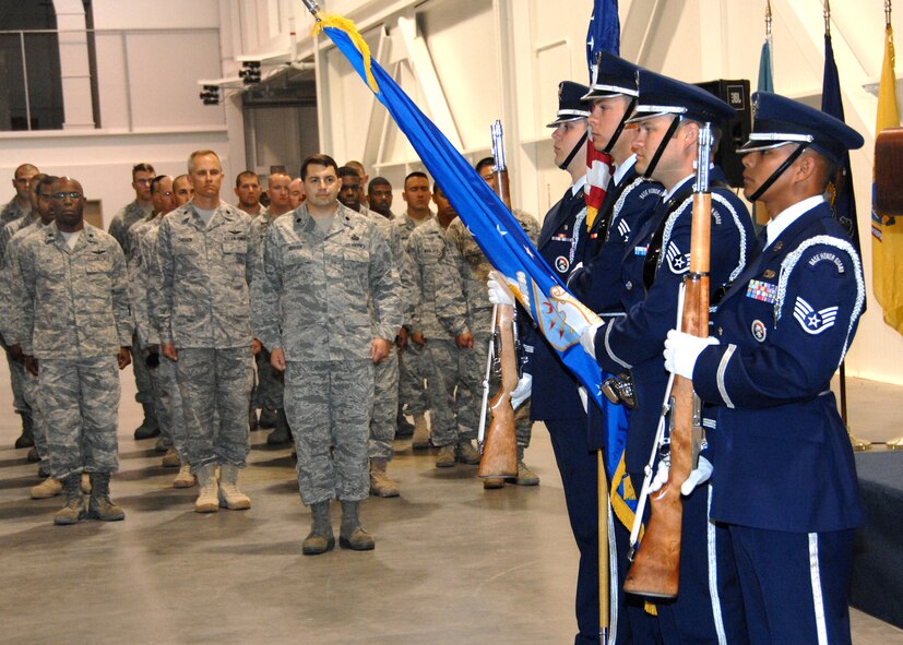 Members of the Travis Honor Guard present "The Colors" prior to the singing of the national anthem, during the 570th Contingency Response Group change of command ceremony on June 25th 2009. (U.S. Air Force photo by Civ/Nan Wylie) 