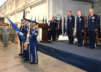 Right to left, Colonel David Chandler the incoming 570th Contingency Response Group commander, Colonel Steven Jordon the outgoing   570th Contingency Response Group commander and Colonel John Lipinski, 615th Contingency Response Wing commander stand at attention while the Travis Honor Guard present "The Colors" during the 570th CRG change of command ceremony. (U.S. Air Force photo by Civ/Nan Wylie) 