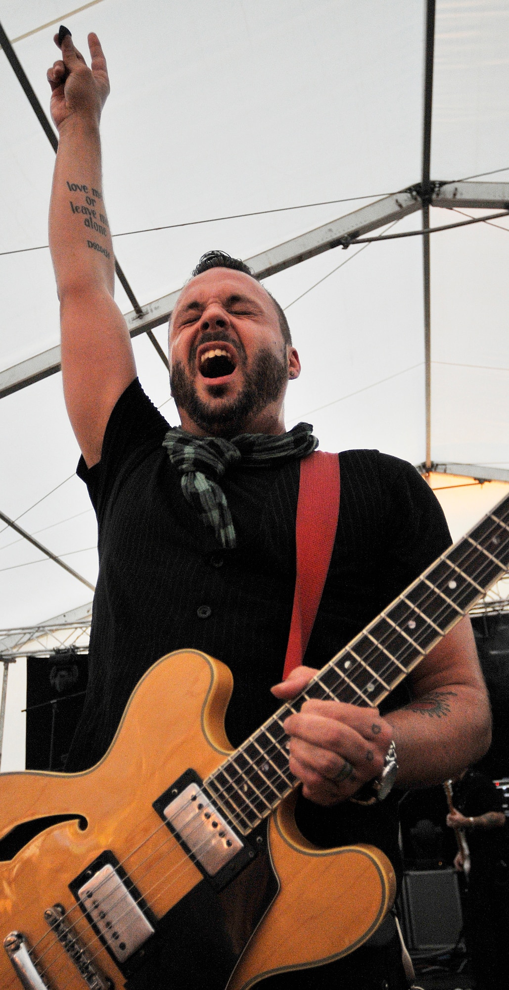 Justin Furstenfeld, lead singer of the band Blue October, sings at the Rockin' Fourth of July celebration, July 4, 2009, Kapaun Air Station, Germany. Kaiserslautern Military Community members celebrated the event with games, rides and concerts and ended the night with fireworks. (U.S. Air Force photo by Staff Sgt. Stephen J. Otero)