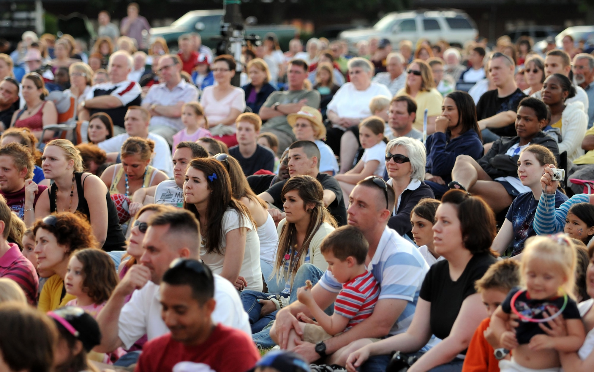 A huge crowd of spectators watch Tops in Blue, the Air Force’s traveling performance group, during a concert held at RAF Feltwell as part of the American Independence Day celebration July 4.  (U.S. Air Force photo by Staff Sgt. Austin M. May)