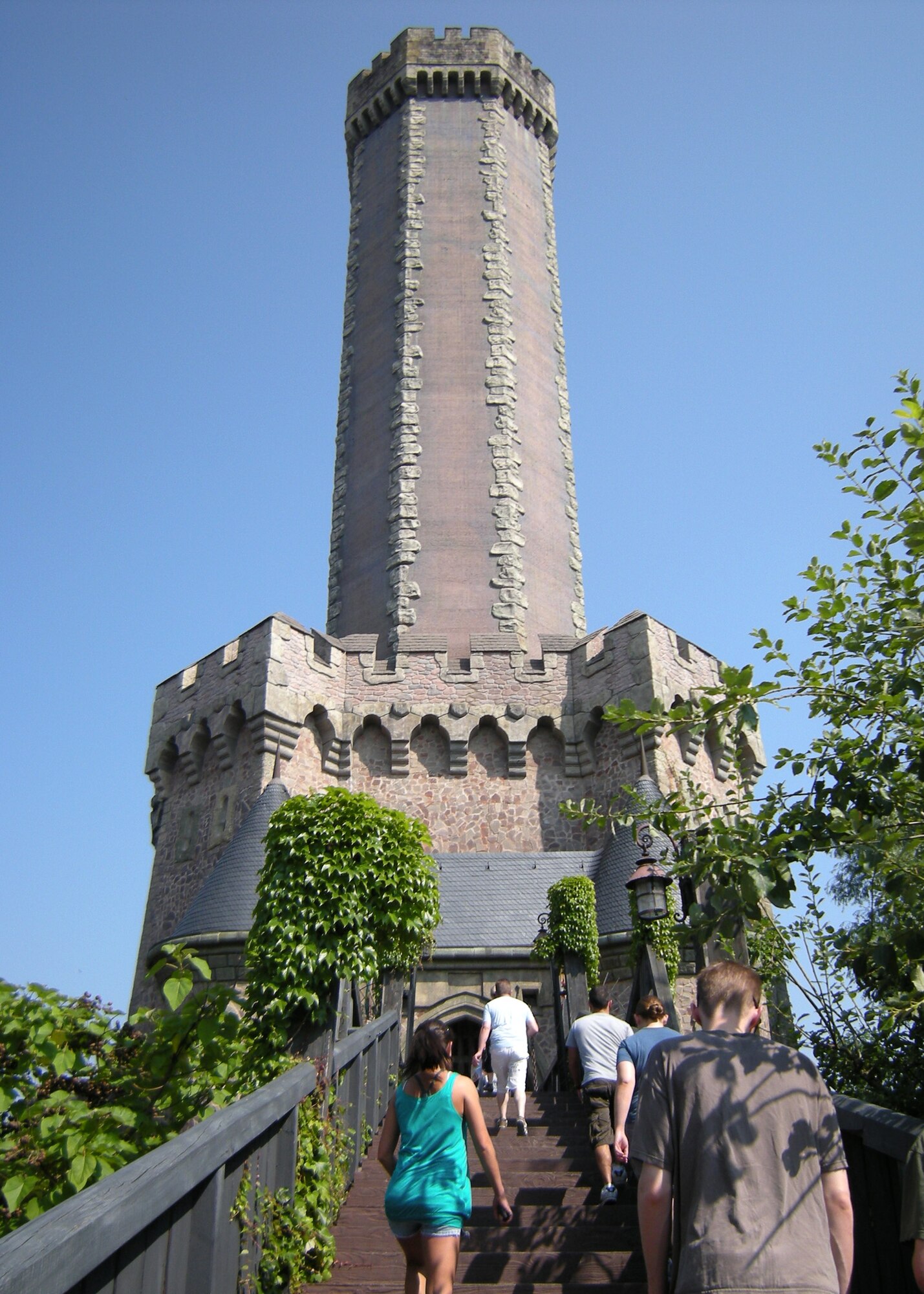 BRUEL, Germany – Guests of the Phantasialand amusement park walk towards the Mystery Castle bungee drop July 2. Phantasialand has a mixture of rides and shows for all ages.  Members from the 52nd Fighter Wing visited Phantasialand and other locations as part of Explore the Eifel. (U.S. Air Force photo by Senior Airman Kali L. Gradishar)