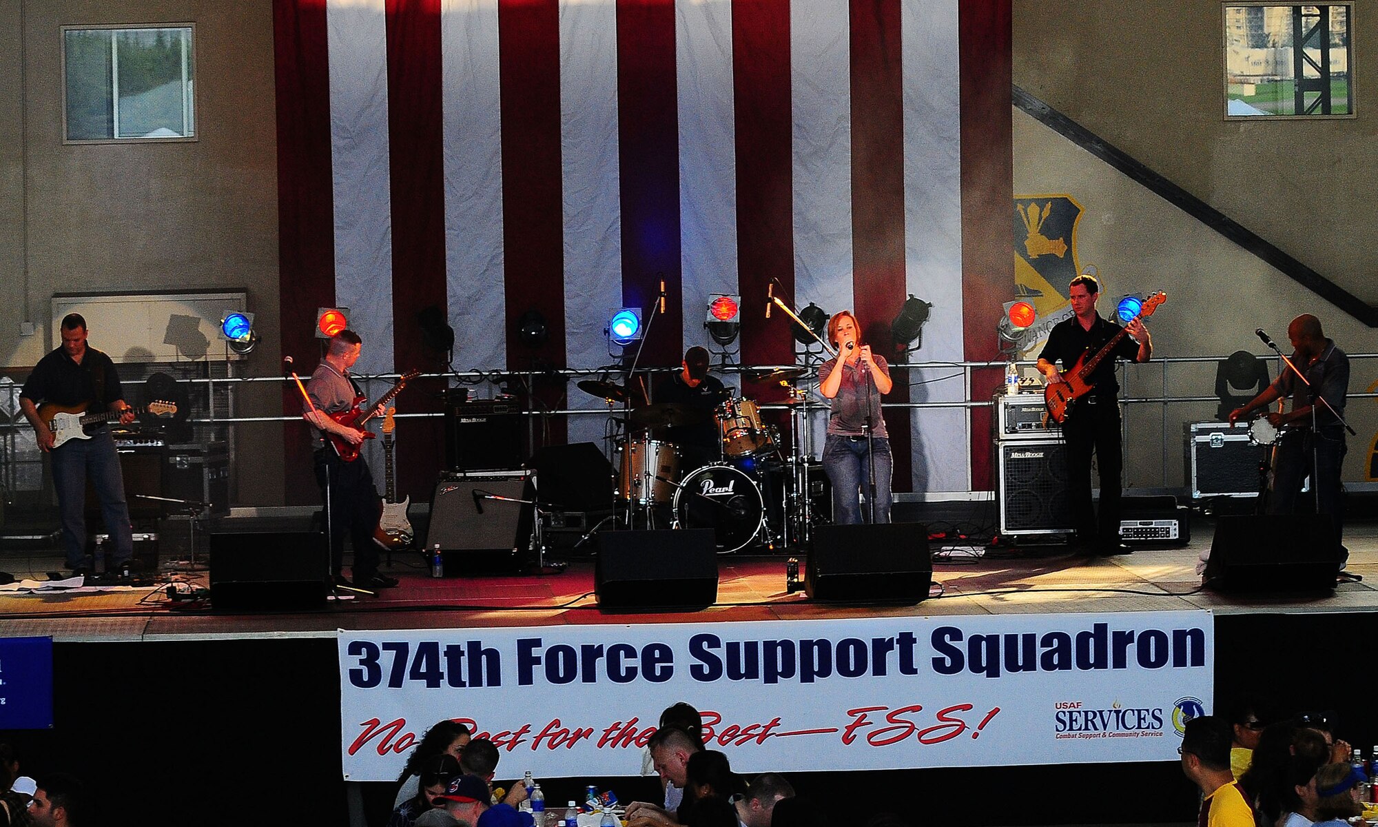 YOKOTA AIR BASE, Japan -- Members of the band Pacific Trends perform during Celebrate America 2009 on July 4. Celebrate America is a day-long Independence Day event that includes a scavenger hunt, 5K fun run, go-carts and musical performances. (U.S. Air Force photo by Airman 1st Class Michael Dillon) 