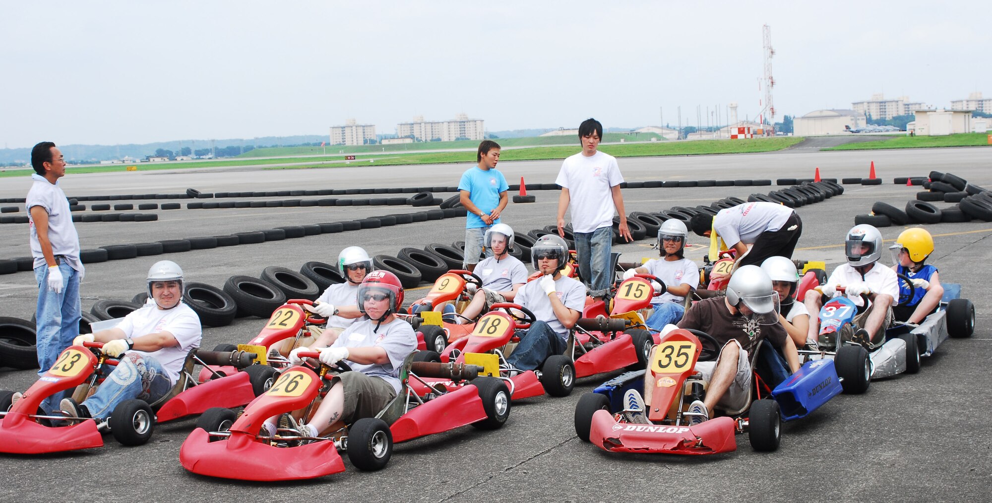 YOKOTA AIR BASE, Japan -- A group of go-cart riders prepare for their turn to ride around a track during Celebrate America July 4. Celebrate America is a day-long
Independence Day event that includes a scavenger hunt, 5K fun run,
go-carts, musical performances and other famliy-oriented events. (U.S. Air Force photo/Airman First Class Sean Martin)
