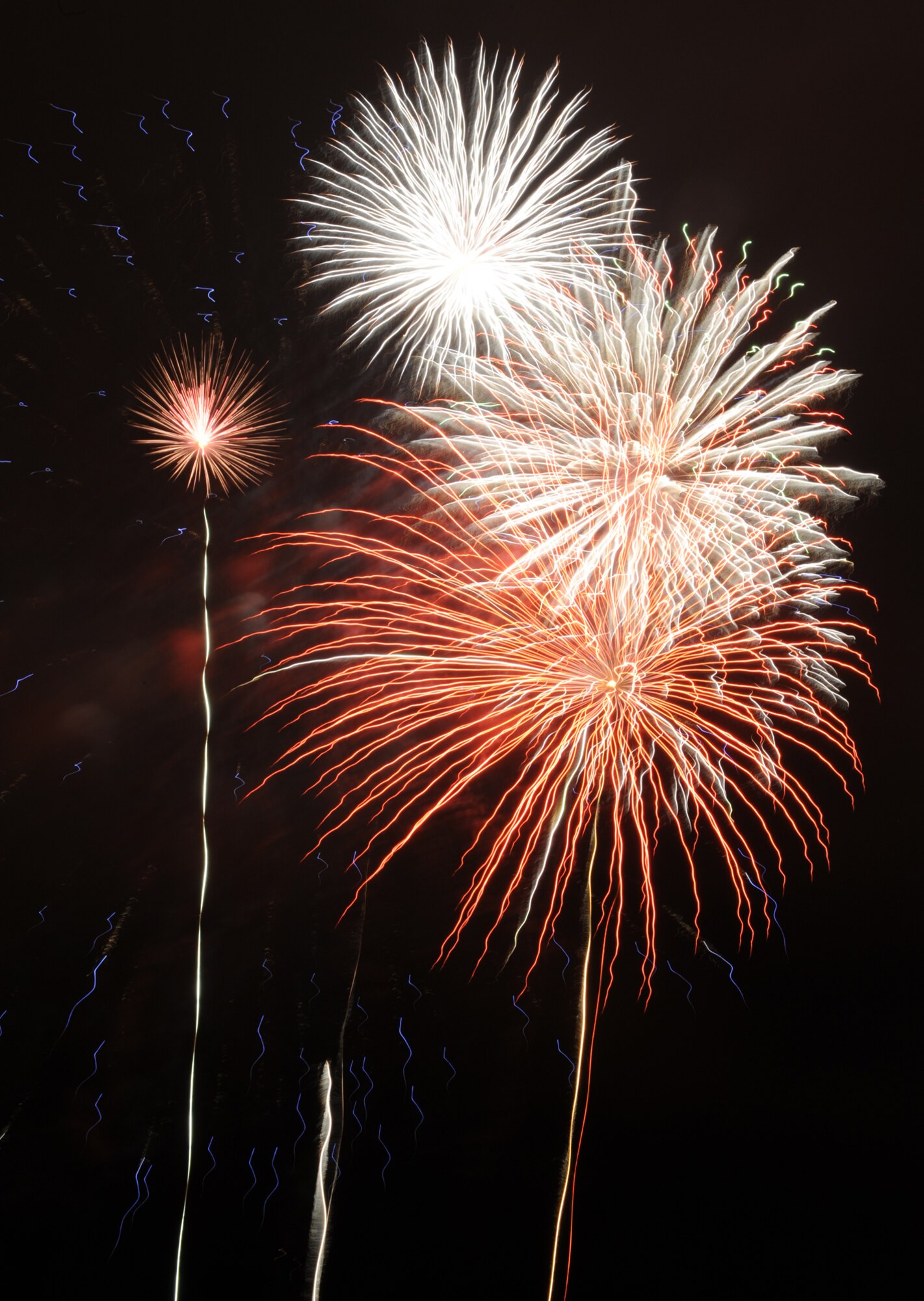 WHITEMAN AIR FORCE BASE, Mo. – Members of Team Whiteman enjoy an “explosive” fireworks display July 4 during the Whiteman Independence Day Celebration at the Ike Skelton Lake. (U.S. Air Force photos/Senior Airman Cory Todd) 