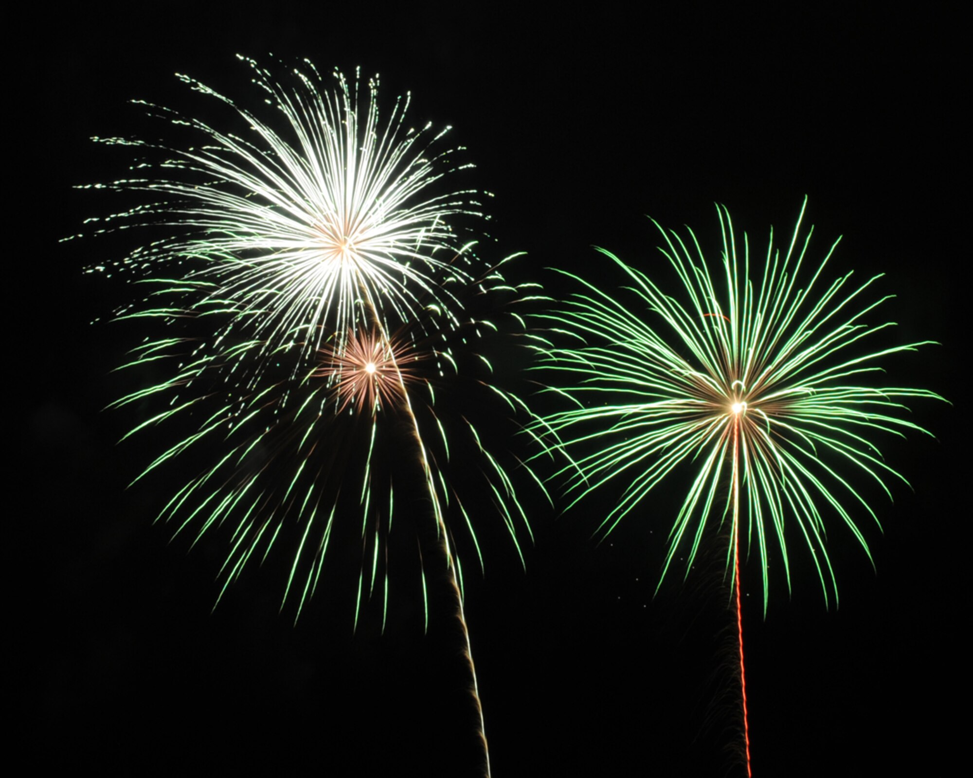 WHITEMAN AIR FORCE BASE, Mo. – Members of Team Whiteman enjoy an “explosive” fireworks display July 4 during the Whiteman Independence Day Celebration at the Ike Skelton Lake. (U.S. Air Force photos/Senior Airman Cory Todd) 