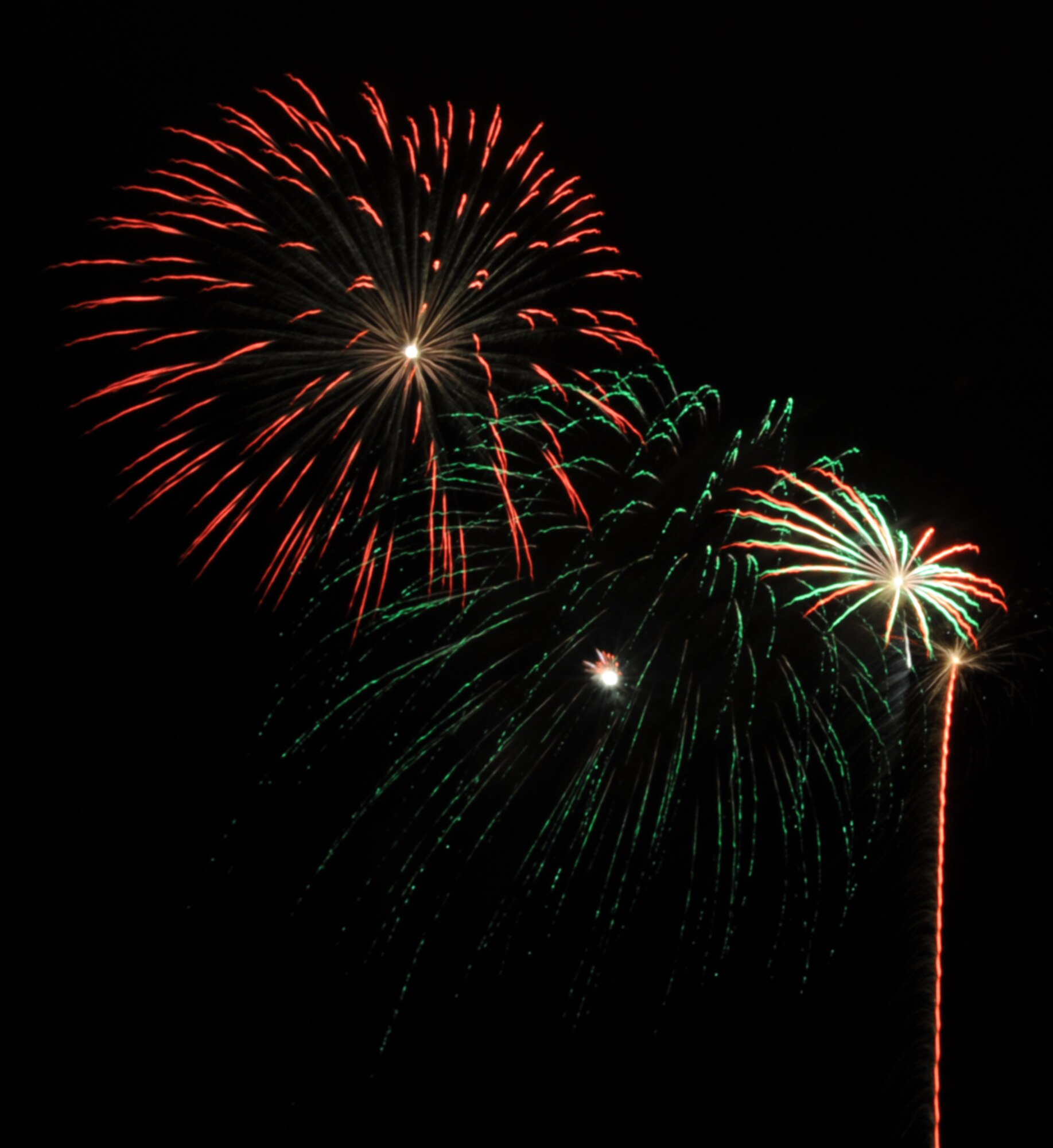 WHITEMAN AIR FORCE BASE, Mo. – Members of Team Whiteman enjoy an “explosive” fireworks display July 4 during the Whiteman Independence Day Celebration at the Ike Skelton Lake. (U.S. Air Force photos/Senior Airman Cory Todd) 