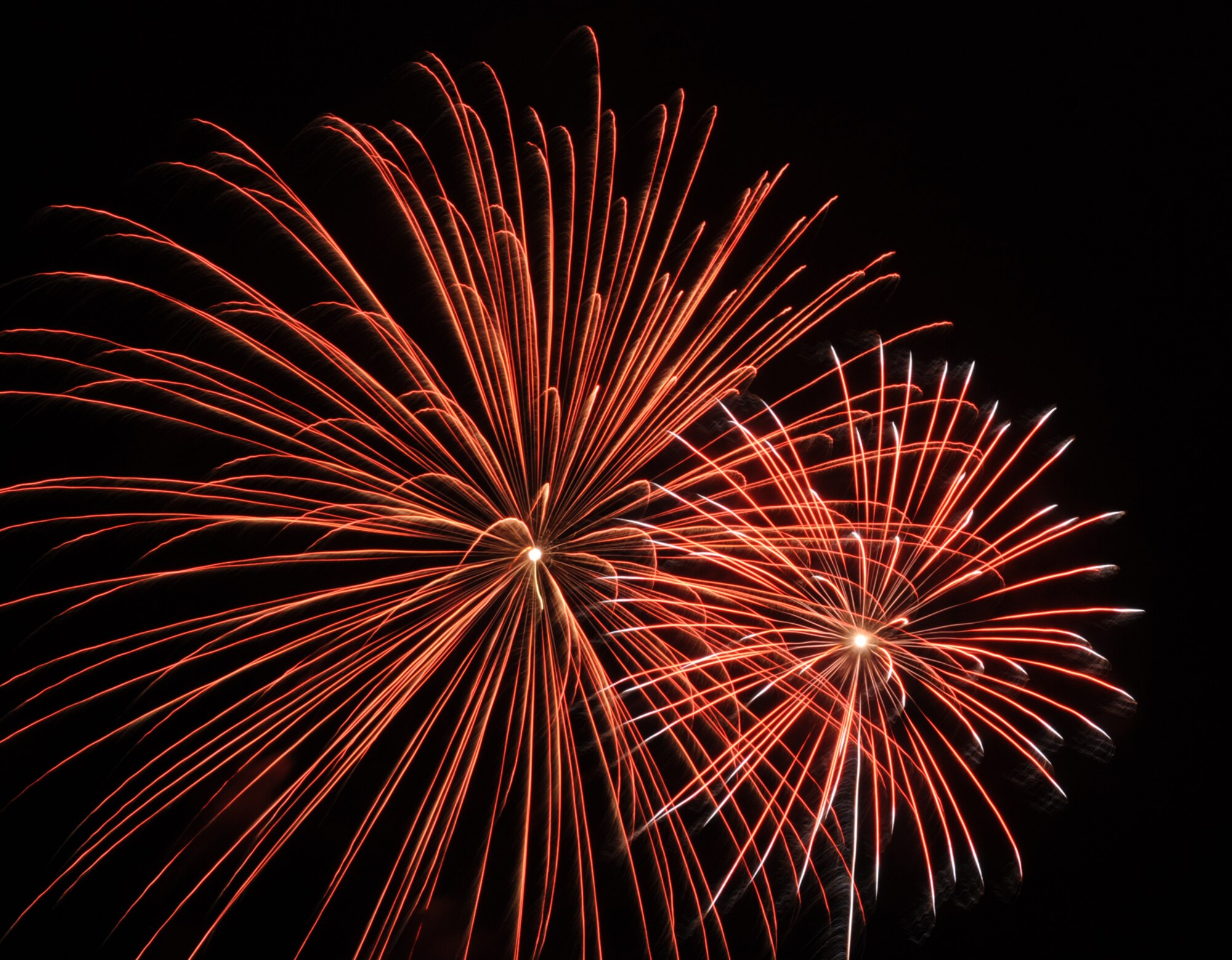 WHITEMAN AIR FORCE BASE, Mo. – Members of Team Whiteman enjoy an “explosive” fireworks display July 4 during the Whiteman Independence Day Celebration at the Ike Skelton Lake. (U.S. Air Force photos/Senior Airman Cory Todd) 