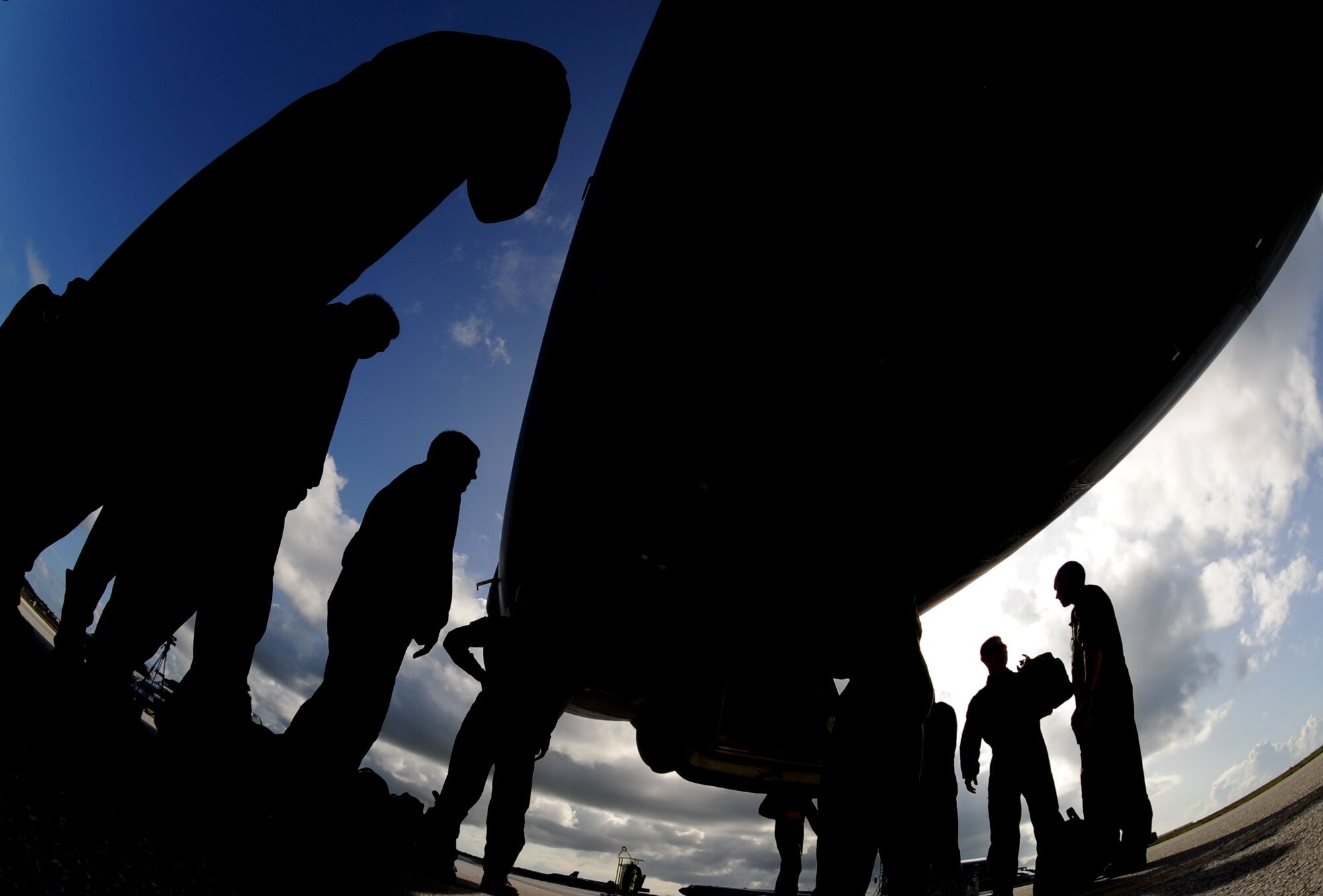 Airmen from the 96th Expeditionary Bomb Squadron greet aircrew members after
landing one of three B-52 Stratofortress when they arrived at Andersen
Air Force Base, Guam.  The B-52s, deployed from Barksdale AFB, La.,
returned here after participating in Northern Edge 2009, an exercise that focuses on tactical-level execution of U.S. Pacific Command training objectives in a joint environment, June 15 through 26. The B-52 bombers are here in support of U.S. Pacific Command's Continuous Bomber Presence in the Asia-Pacific Region. (U.S. Air Force photo/ Senior Airman Christopher Bush)
