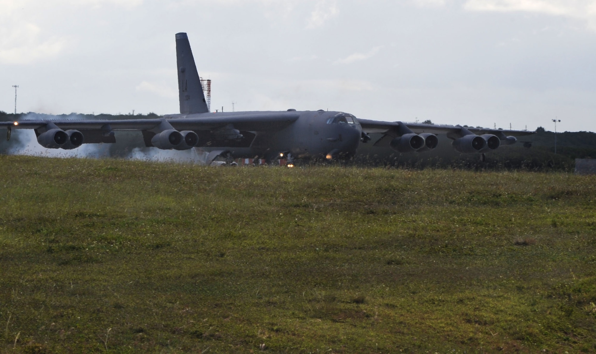 One of three B-52 Stratofortress bombers, from the 2nd Expeditionary Bomb
Squadron, lands at Andersen Air Force Base, Guam.  The B-52, deployed from Barksdale AFB, La., returned here after participating in Northern Edge 2009, an exercise that focuses on tactical-level execution of U.S. Pacific Command training objectives in a joint environment, June 15 through 26. The B-52 bombers are here in support of the U.S. Pacific Command's Continuous Bomber Presence in the Asia-Pacific Region. (U.S. Air Force photo/ Senior Airman Christopher Bush)
