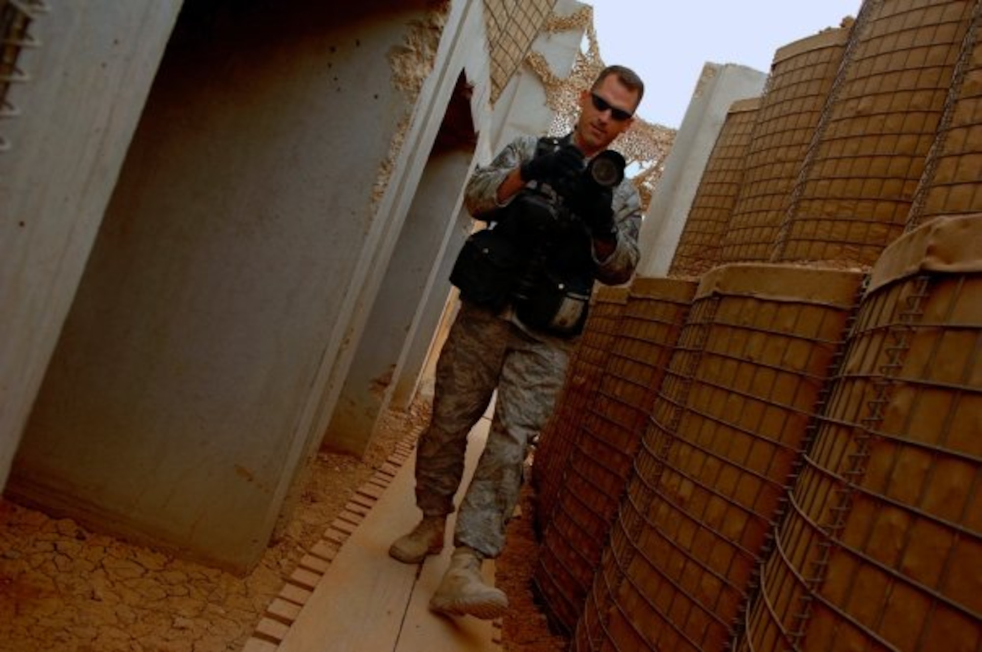 Master Sgt. Andy Dunaway, shown here documenting events in Iraq in 2006, is an aerial combat photojournalist assigned to the 1st Combat Camera Squadron from Charleston Air Force Base, S.C. (U.S. Air Force photo/ Master Sgt. Jeff Allen)