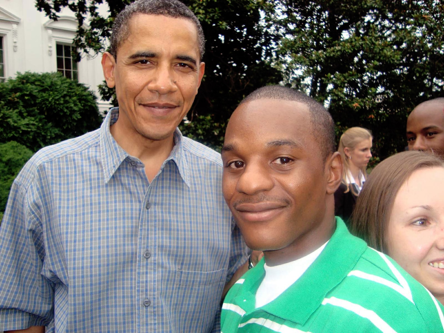 Senior Airman Duane Dunlap visits with President Barack Obama during a Salute to the Military event at the White House on the Fourth of July. Airman Dunlap, a security forces journeyman assigned to the 59th Patient Squadron at Lackland Air Force Base, Texas, was one of five Airmen chosen to attend the event that included dinner, fireworks and a chance to meet President Obama and the First Lady. (U.S. Air Force photo/Staff Sgt. Theda Franklin) 
