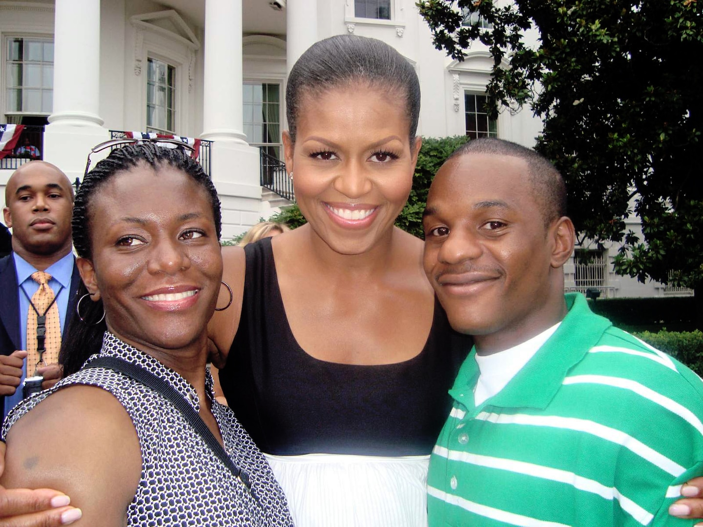 Senior Airman Duane Dunlap (right) and Staff Sgt. Theda Franklin (left) visit with First Lady Michelle Obama at the White House during a Salute to the Military event on the Fourth of July. Airman Dunlap is an Air Force wounded warrior who was chosen to attend the event that included dinner, fireworks and a chance to meet the president and first lady. Sergeant Franklin is assigned to the 59th Medical Wing at Lackland Air Force Base, Texas. (U.S. Air Force photo) 
